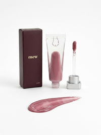 mew lip glaze in Velvet, a pink red, with its swatch